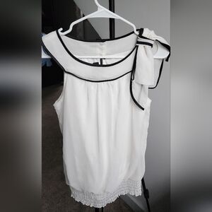 A Byer Elegant White Sleeveless Top with Black Trim